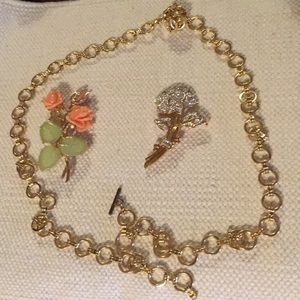 Belt with interchangeable rose buckles/broach